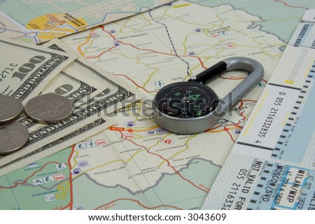 Objects for planning travel - a map, compass, a magnifier, money