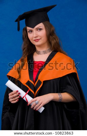 Young woman in black graduation gown hold certificate of degree over blue background.