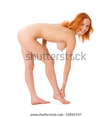 stock photo Sexy naked redhead woman in studio on white