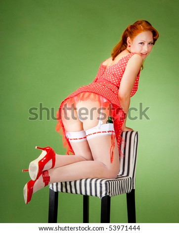 Pin-up style girl shows her beautiful ass