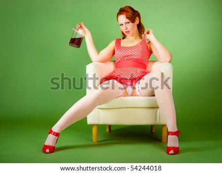 aujourdhui c'est MAAAAXXXX Stock-photo-pin-up-style-girl-on-the-chair-drinks-whiskey-54244018