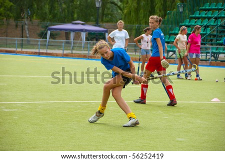 SUMY, UKRAINE - JUNE 28: A Girls bandy (hockey) team trains in a stadium on June 28, 2010 in Sumy, Ukraine