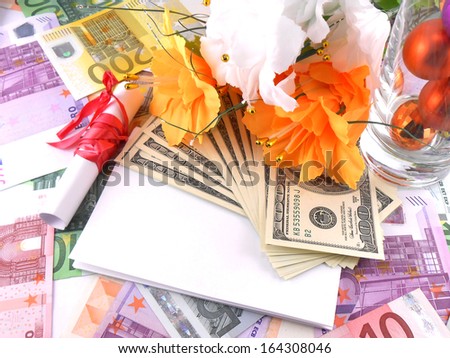 invitation card with flowers, white paper with red bow and money