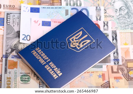 ukrainian passport with euro notes and american dollars