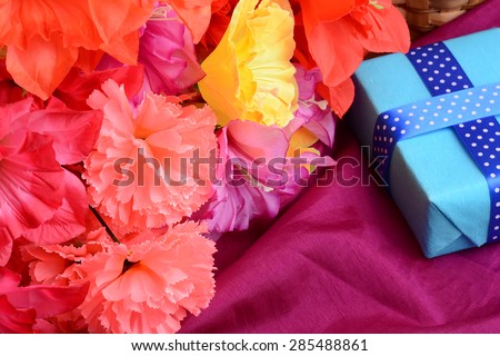 Sweet color flowers from mulberry paper with holiday gift box