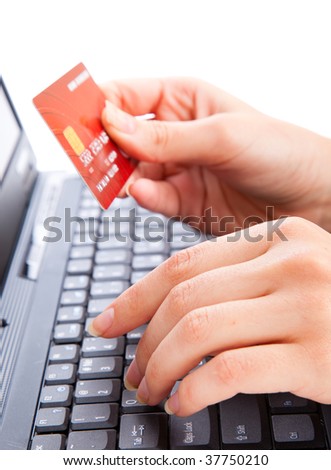 Credit card in hand for buying online