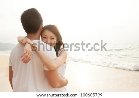 Attractive Young Couple on the Beach