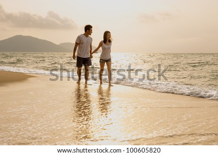 Attractive Young Couple on the Beach
