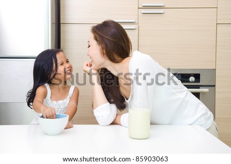 Happy Asian Family having breakfast together in the morning