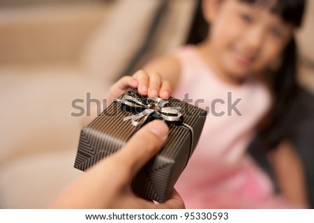Asian Girl Receiving Gift