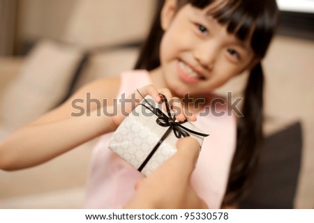 Asian Girl Receiving Gift