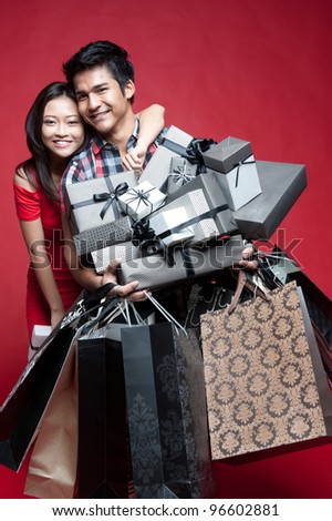 Asian shopping with bags and presents