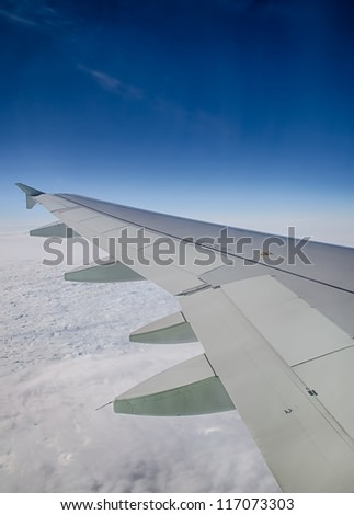 View of clouds from a airplane window. HDR image