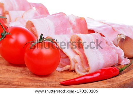 Red meat bacon rolled with tomato and pepper