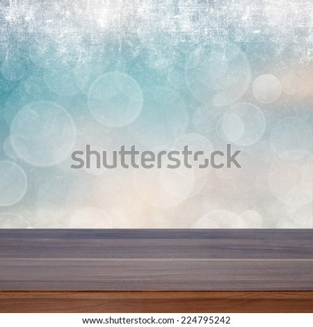 Empty wooden deck table with bokeh background. Ready for product display montage
