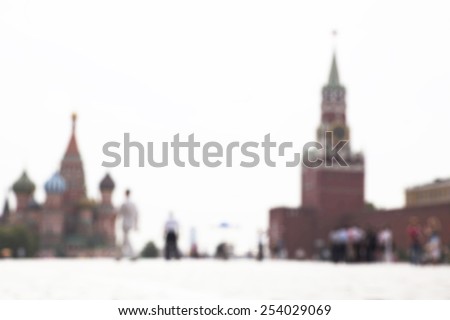 Blurry background-Moscow Kremlin and walking people on Red Square