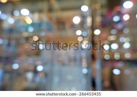 Beautiful bokeh lights reflected in a shop window,shallow depth of focus
