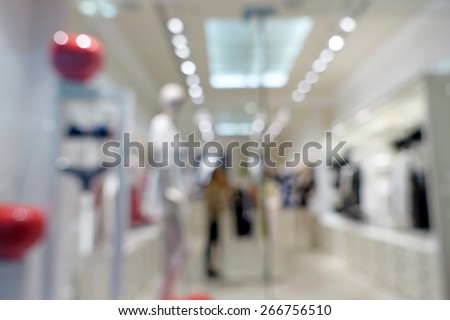 Fashionable brand new interior of cloth store.Shallow depth of focus