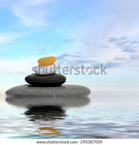 Zen spa concept background - Zen massage stones reflected in water