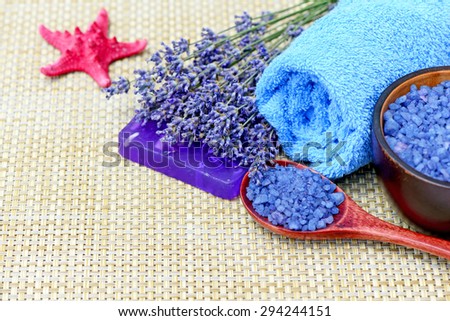 Spa treatments of lavender flowers, lavender soap and lavender sea salt