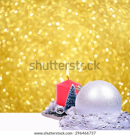 Christmas background with silver balls and candle