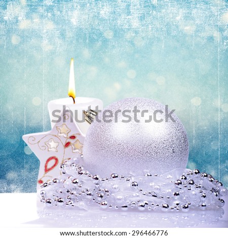 Christmas background with silver balls and candle