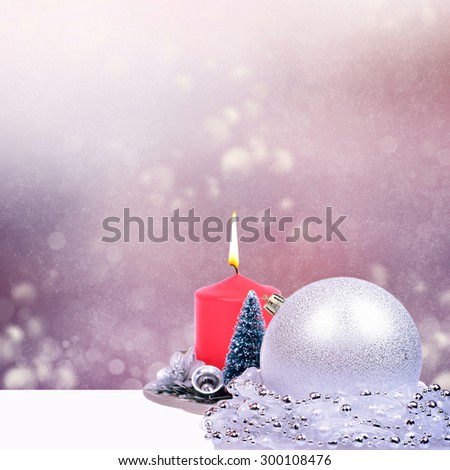 Christmas card with silver balls and candle
