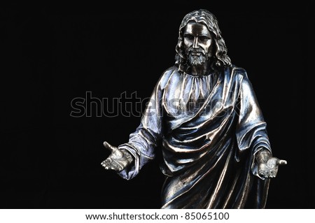 Vintage statue of Jesus Christ with hands outstretched