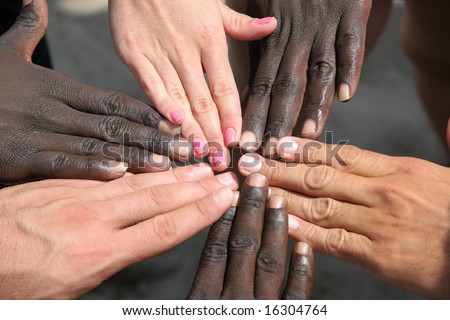 stock photo : White hands, black hands, pink nails - all together