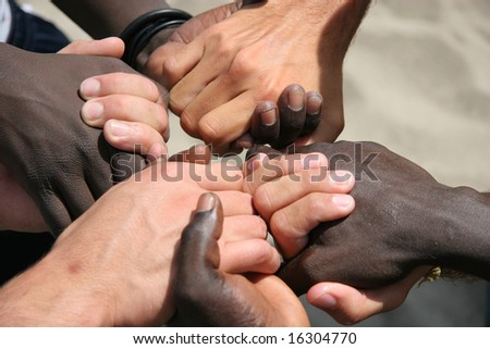 Black And White Hands Together. stock photo : Black and white