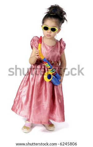 Small girl sun-protective spectacles with saxophone in hand
