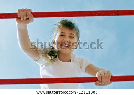 Smile girl in play. Outdoor color image.