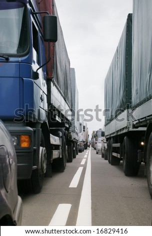 Many trucks stopped on European road