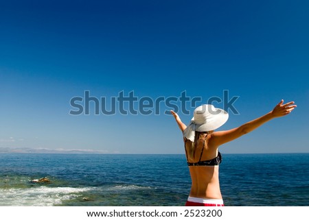 The happy woman on a beach