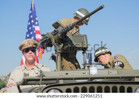 San Pedro, CA - November 8: US veterans in military vehicle at the Veterans Week in Port of Los Angeles in San Pedro, CA on November 8, 2014