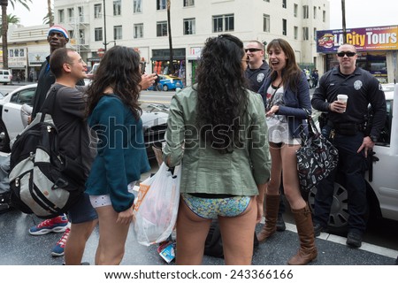 Los Angeles, CA - January 11, 2015: Women without pants and police in Hollywood in the 7th Annual International \