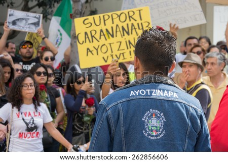 Los Angeles, California, USA - March 22, 2015 - Relatives of the 43 students who disappeared in Mexico  packed the streets of downtown Los Angeles to bring attention to their cause and seek support.