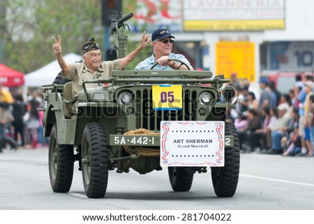Canoga Park, CA, USA - May 25, 2015: US veterans in military vehicle during Memorial Day Parade