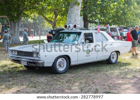 Woodland Hills, CA, USA - May 30, 2015: Vintage Dodge Coronet police car on display during 12th Annual LAPD Car Show & Safety Fair.