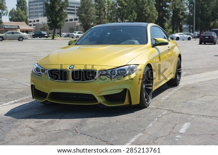 Woodland Hills, CA, USA - June 7, 2015: BMW M4  car on display at the Supercar Sunday car event.