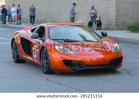 Woodland Hills, CA, USA - June 7, 2015: McLaren MP4 car on display at the Supercar Sunday car event.