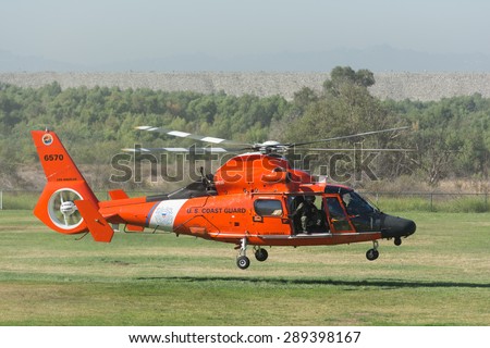 Lakeview Terrace, CA, USA - June 20, 2015: U.S. Cost Guard helicopter during Los Angeles American Heroes Air Show, event designed to educate the public about rotary-wing aviation.