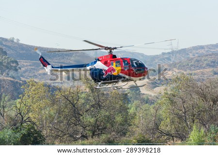 Lakeview Terrace, CA, USA - June 20, 2015: Red Bull helicopter during Los Angeles American Heroes Air Show, event designed to educate the public about rotary-wing aviation.
