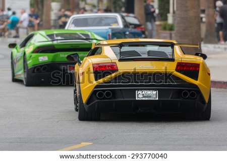 Woodland Hills, CA, USA - July 5, 2015: Lamborghini Huracan and Lamborghini Gallardo car on display at the Supercar Sunday car event.