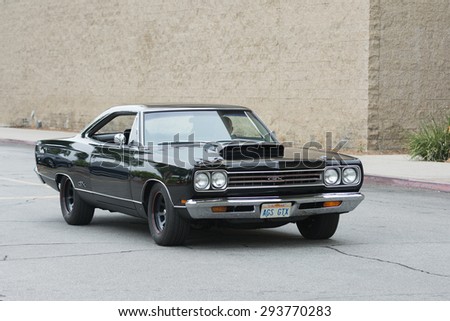 Woodland Hills, CA, USA - July 5, 2015: Plymouth GTX car on display at the Supercar Sunday car event.