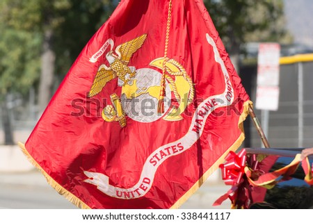 Mission Hills, USA - November 11, 2015: United States Marine Corps flag during The San Fernando Valley Veterans Day Parade