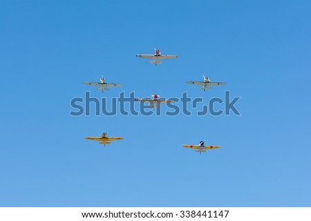 Mission Hills, USA - November 11, 2015: World War II military planes fly during The San Fernando Valley Veterans Day Parade