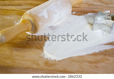 rolling pin and flour on the board