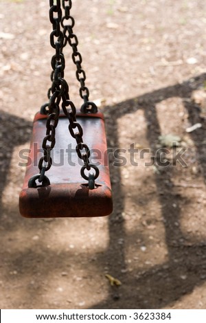 swing and chains. light and shadow.