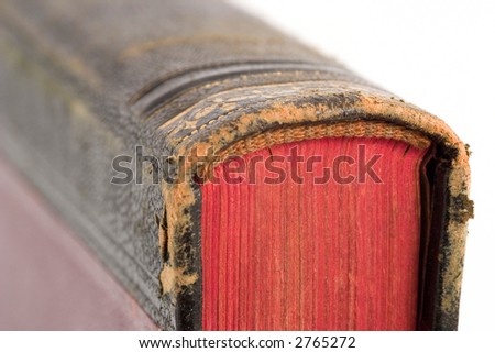 Close-up of an old book\'s spine, selective focus